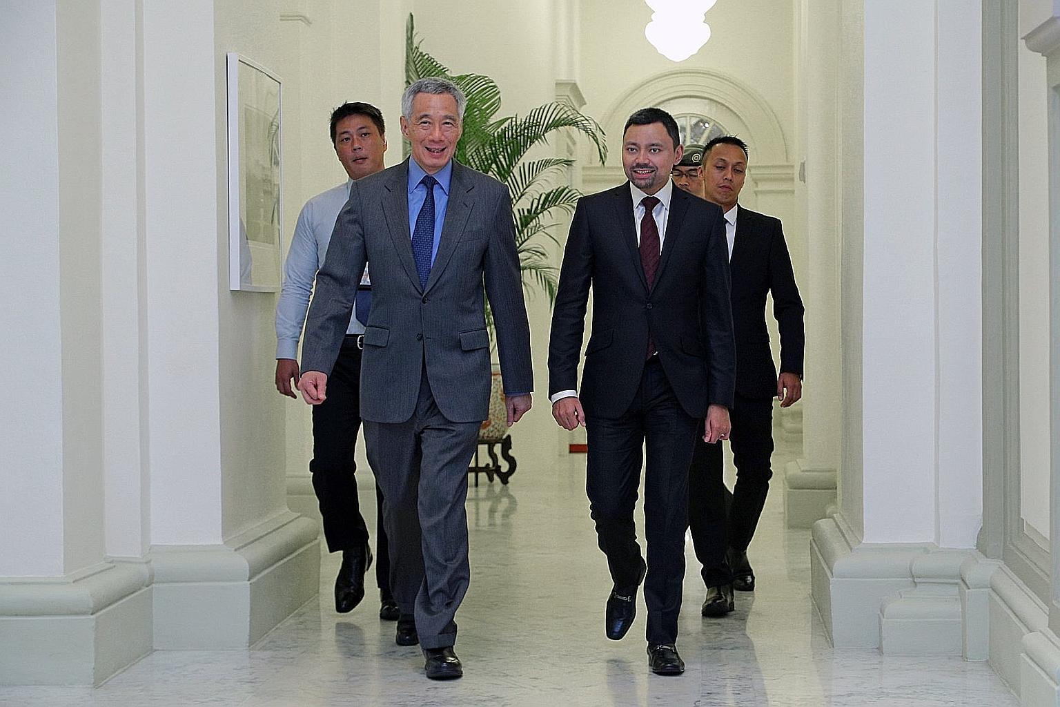 Prime Minister Lee Hsien Loong hosted Brunei Crown Prince Haji Al-Muhtadee Billah (third from left) and his delegation to lunch at the Istana yesterday. The Crown Prince is leading a delegation for the 6th Singapore-Brunei Young Leaders' Programme. H