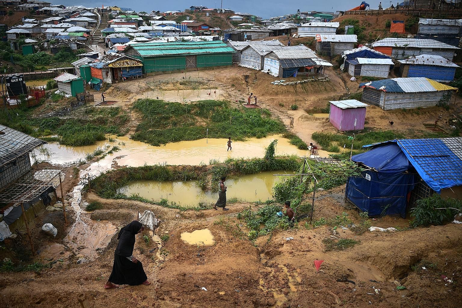 The ST team spent nine days in Bangladesh to curate a first-hand account of the daily existence of the Rohingya refugees in camps there. Rohingya refugees at the Kutupalong mega camp in Bangladesh's Cox's Bazar district in July. About 919,000 Rohingy
