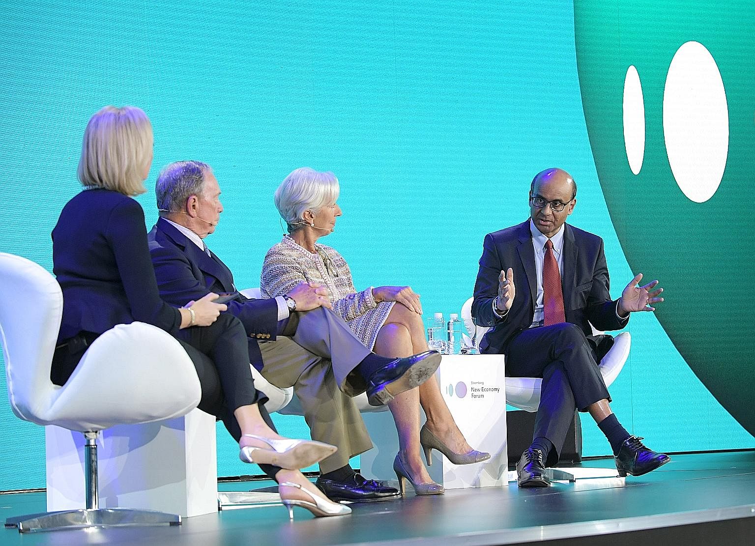 Deputy Prime Minister Tharman Shanmugaratnam sharing his views at a panel discussion yesterday at the Bloomberg New Economy Forum. With him are (from left) moderator and Bloomberg TV editor-at-large Francine Lacqua, former New York mayor Michael Bloo