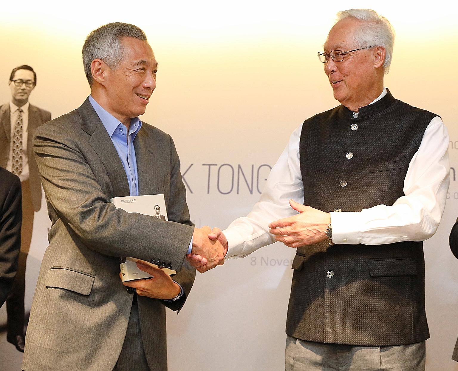 Prime Minister Lee Hsien Loong with Emeritus Senior Minister Goh Chok Tong at yesterday's launch of Tall Order: The Goh Chok Tong Story, which PM Lee said is particularly timely as a major theme in it is leadership renewal, and the next team to lead 