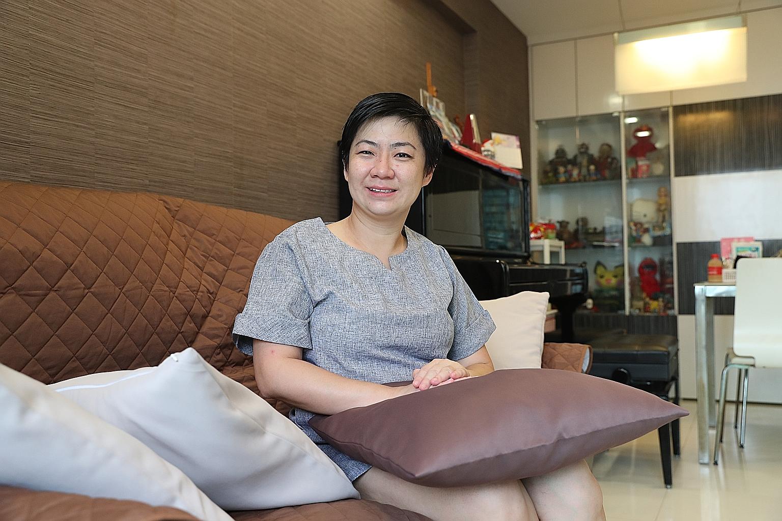 Ms Low relaxing at home with her husband Francis Tang and daughters Juliet (left) and Emily, and their family dog. Ms Low attending the Convention on the Rights of Persons with Disabilities at the UN headquarters in New York in 2015. She lost her hea