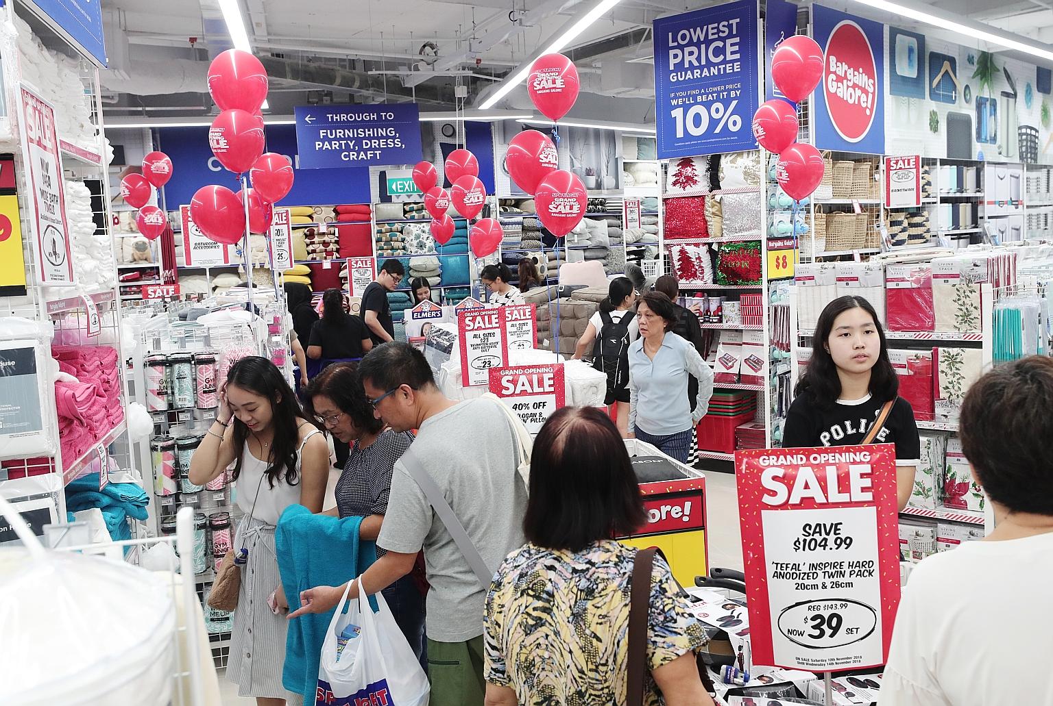 Shoppers at Spotlight's Westgate store yesterday. Nearly 300 shoppers queued outside the store ahead of its opening at 10am.