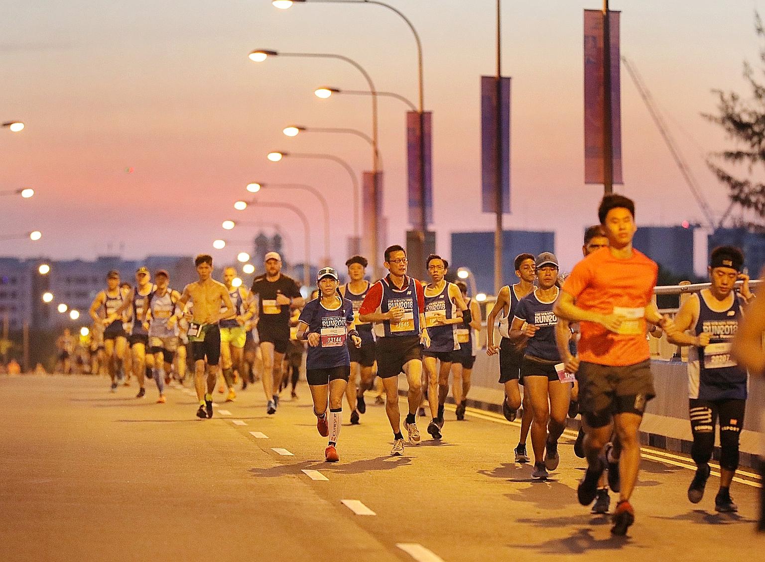 (Above) Runners in the 10km race at the ST Run in September. A new study found that the greater someone's fitness, the less likely he was to have died prematurely and vice versa.