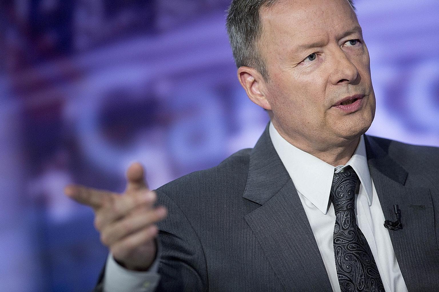 Mr Keith Alexander speaking at a 2014 interview. The former director of the US' National Security Agency called for cyber threat exercises involving different sectors, and between the Singapore Government and industry players, when he testified yeste