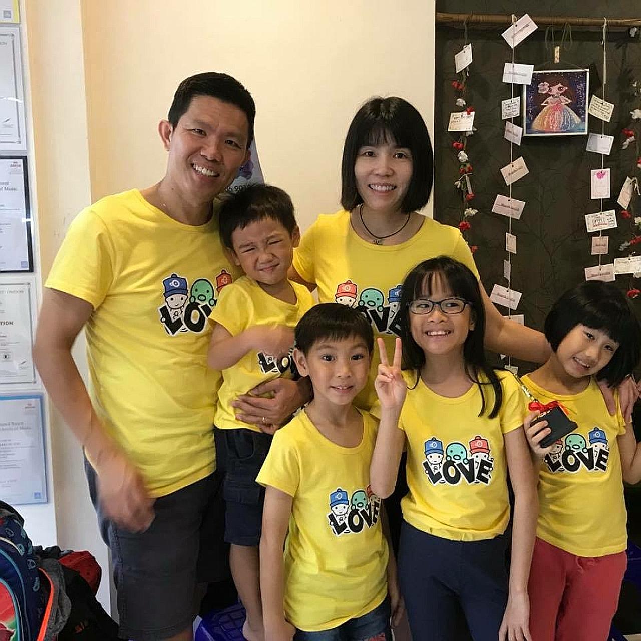 Mr Dickson Lim, 49, and his wife Allison Chong, 43, adopted their four children when they were newborn without asking to see their photos. Today, (from left) Alan is four; Daryl, six; Dawn, nine; and Amanda, eight. They attend student care and childc