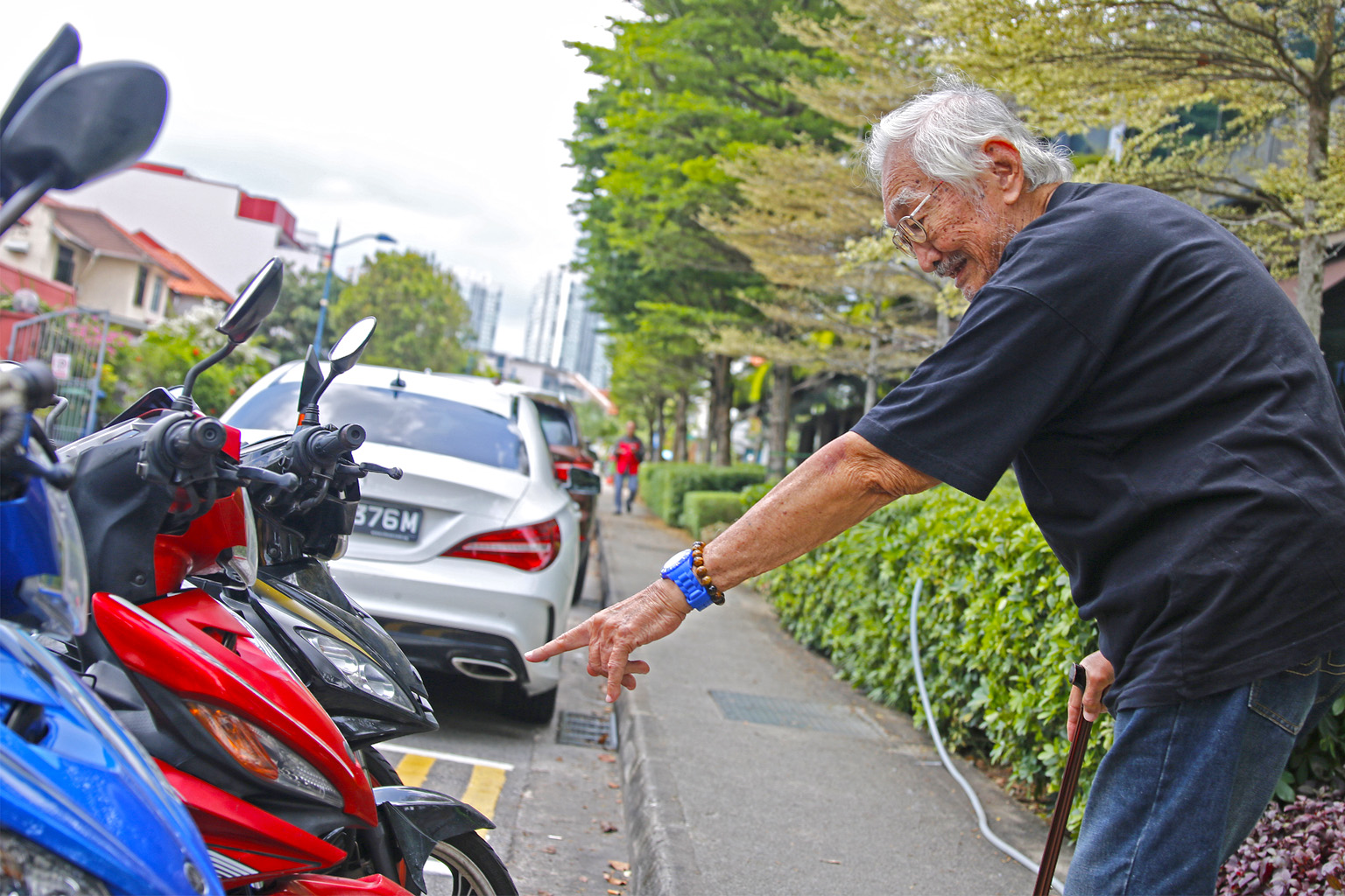 Mr Armstrong Alfred Harris may have given up racing but the passion continues to ignite a flame in him. The thrill seeker in his racing days (left, ahead of a fellow racer) during an event at the former Upper Thomson Road Circuit.
