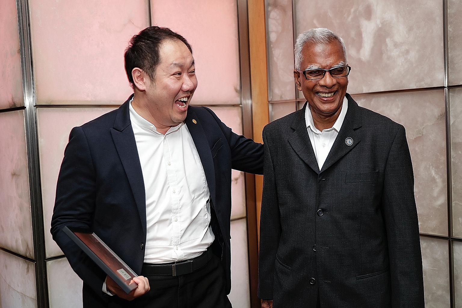 Assigned solicitor Siaw Kin Yeow (left), 48, and Mr Ramasamy Palanisamy at the Legal Aid Bureau's 60th anniversary dinner yesterday.