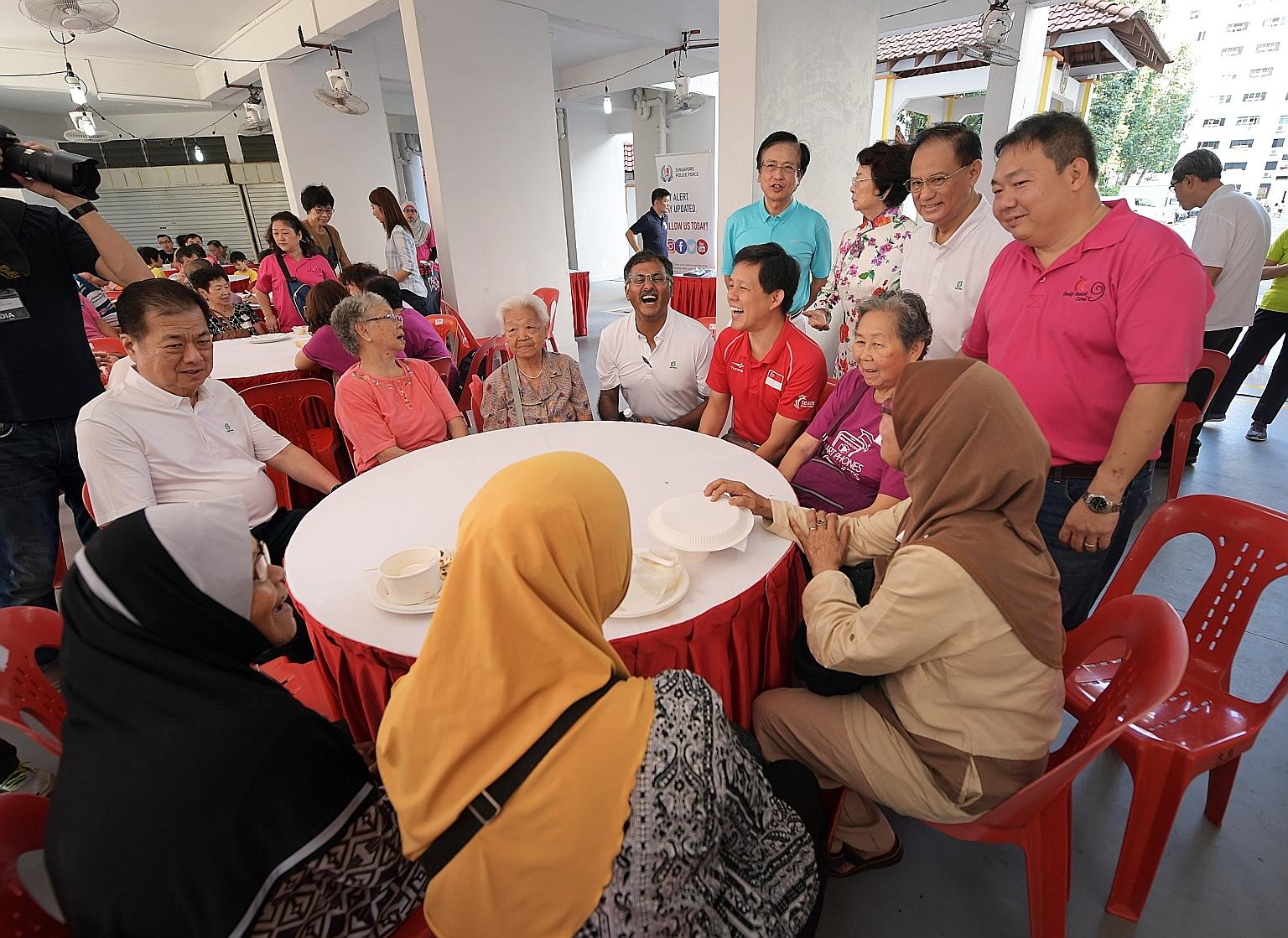 Then Minister in the Prime Minister's Office Chan Chun Sing (fifth from far left) with MP Murali Pillai (fourth from left) during a ministerial community visit to Mr Murali's Bukit Batok ward in July last year. Mr Chan seems to have stayed true to hi