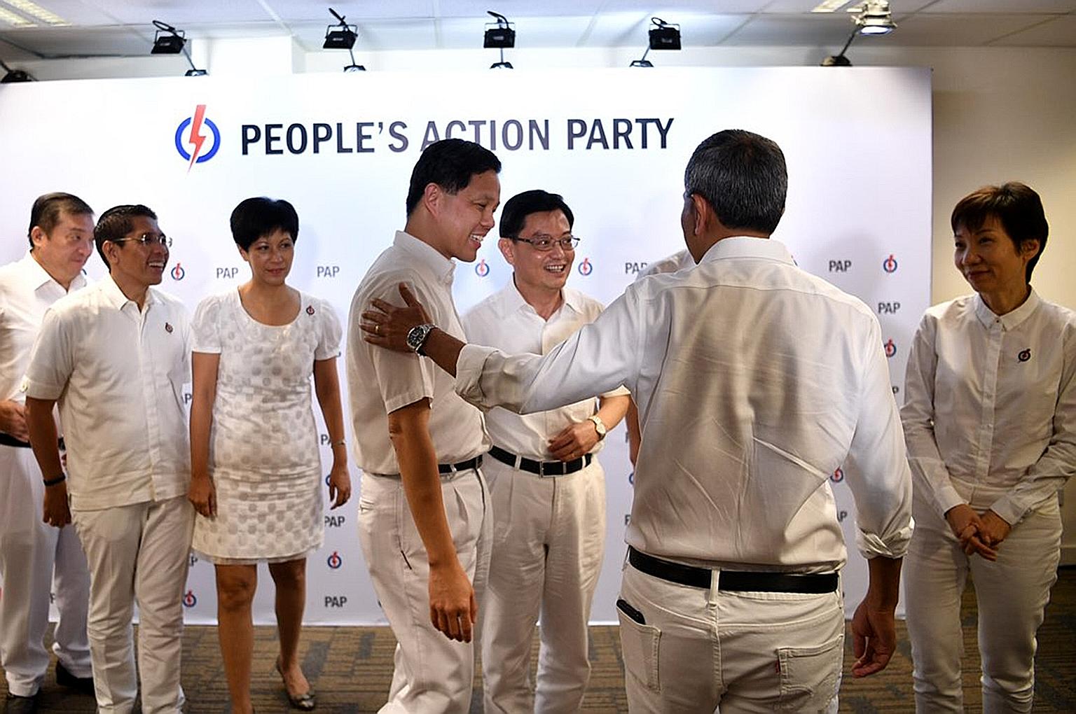 Members of the People's Action Party's fourth-generation leadership team after the press conference at the PAP headquarters in Bedok yesterday. From left: Mr Sitoh Yih Pin, Dr Maliki Osman, Ms Indranee Rajah, Mr Chan Chun Sing, Mr Heng Swee Keat, Dr