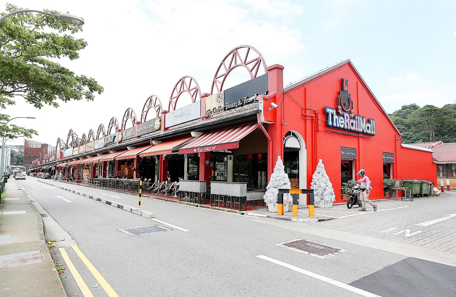 Three shophouses in Mosque Street - Nos. 48, 49 and 50 (above) - were sold for $64.8 million and converted into a boutique hotel, while four shophouses at Rail Mall (right), a stretch of shopping and dining outlets in Upper Bukit Timah Road, were sol