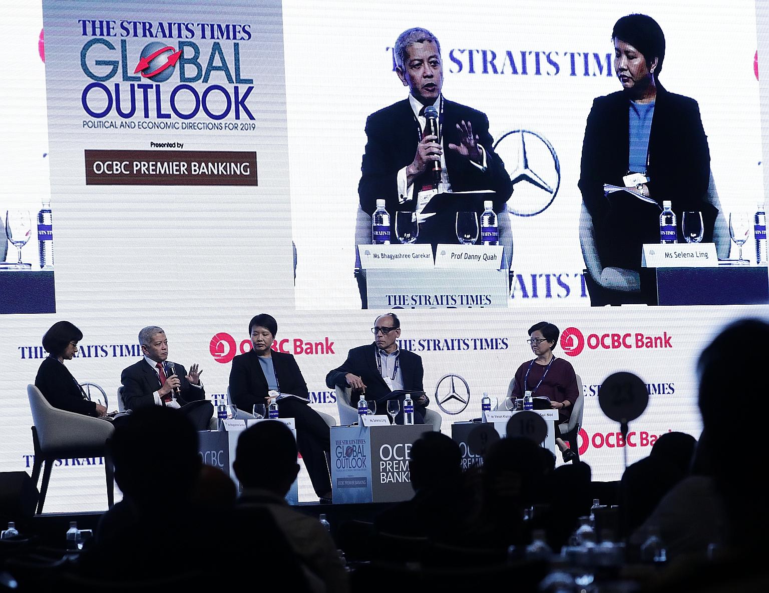 (From far left) Moderator and ST deputy foreign editor Bhagyashree Garekar; Lee Kuan Yew School of Public Policy dean Danny Quah; OCBC Bank's head of treasury research and strategy Selena Ling; ST associate editor Vikram Khanna; and ST East Asia edit