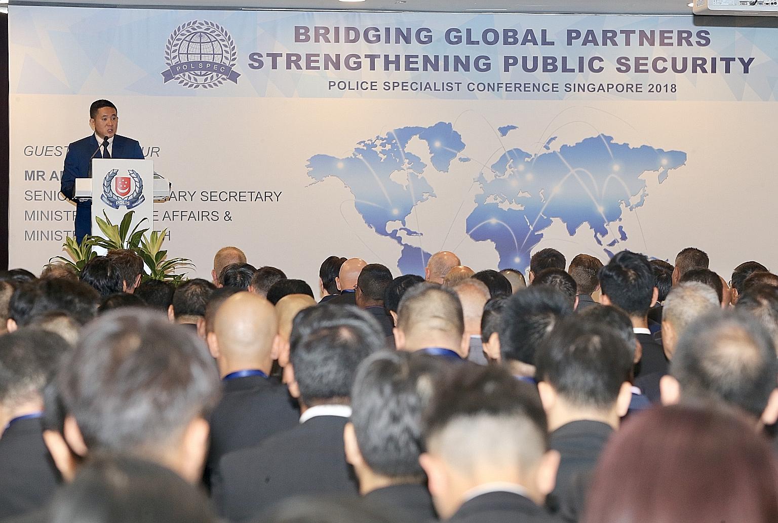 Senior Parliamentary Secretary for Home Affairs Amrin Amin speaking at the inaugural Police Specialist Conference yesterday. Law enforcement representatives from 13 countries will discuss policing issues during the three-day meet.
