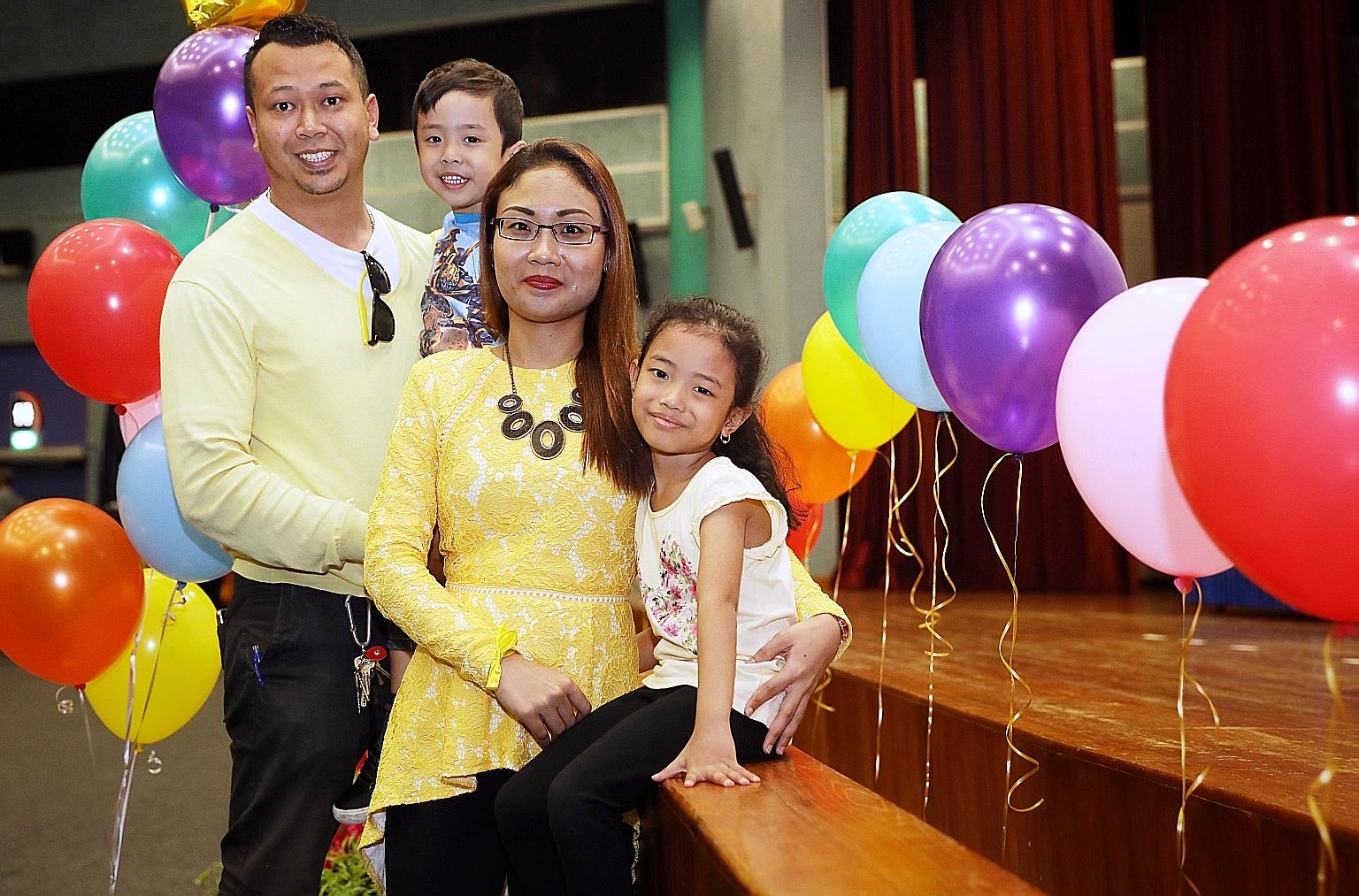Mr Faizal Jamil with his wife, Madam Normaya Johari, and children Nayli Yusyairah (right), six, and Izz Haziq, three. The couple and their daughterhave completed the pilot KelasMateMatika@CC programme.