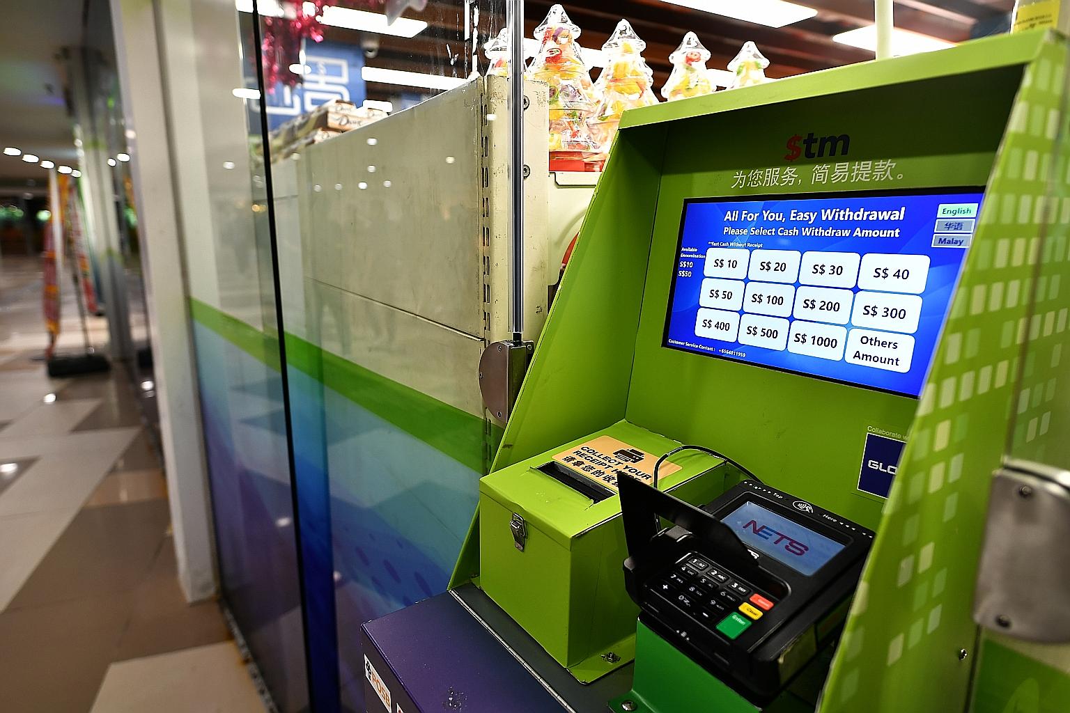 The first $tm machine was installed outside the Sheng Siong supermarket at ITE College Central in Ang Mo Kio in April. It allows users to withdraw amounts starting at $10 from their bank accounts at four banks.