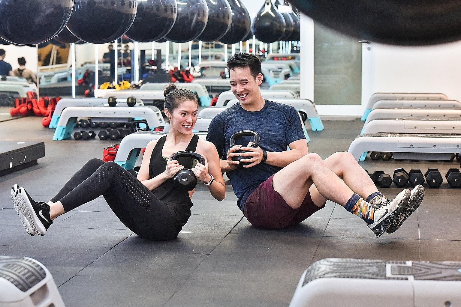 Ms Victoria Martin-Tay has a master's degree from Harvard University, but she quit the engineering field to start fitness and boxing studio bo0m with her husband Bryan Tay, a Princeton University graduate and former Singapore national swimmer, in Feb