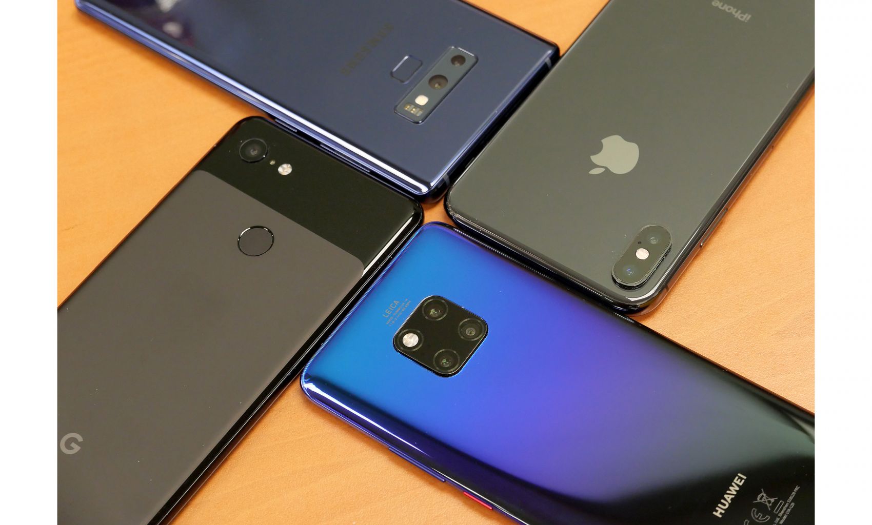 Smartphone Camera Shoot-out: (From top right clockwise) Samsung Galaxy Note9, Apple iPhone XS Max, Huawei Mate 20 Pro and Google Pixel 3 XL. ST PHOTO: TREVOR TAN