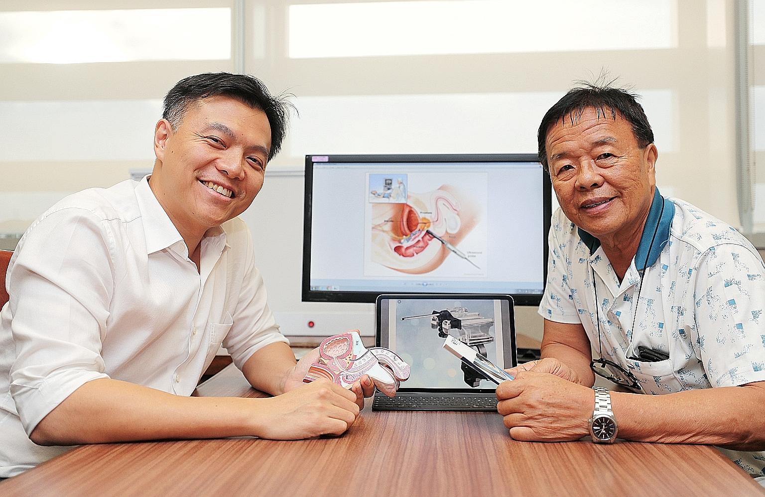 Dr Lincoln Tan (left), NUH's director of urologic oncology, with Mr Tan Ai Poh, a patient who had the transperineal prostate biopsy carried out last month with local anaesthesia and has been given the all-clear.