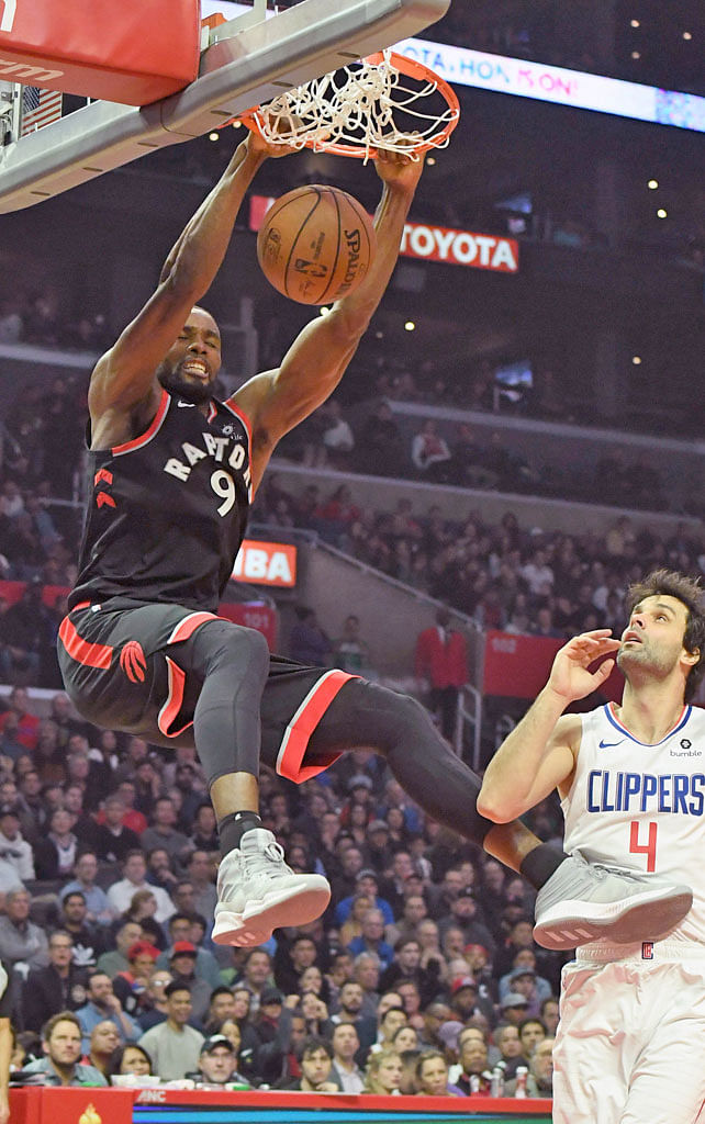 Toronto Raptors forward Serge Ibaka dunking the ball in the second half, as LA Clippers guard Milos Teodosic watched at Staples Centre on Tuesday. The Raptors won 123-99, improving their league-leading record to 22-7.