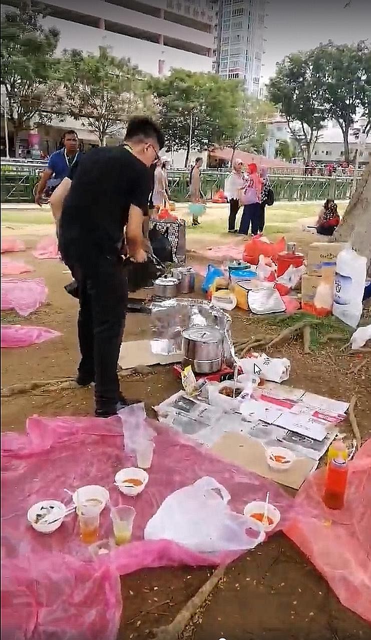 Photos from a video showing NEA officers clearing food and other related items from a field in Paya Lebar on Sunday. The agency has warned that it will not tolerate illegal hawking because of the health risks involved.