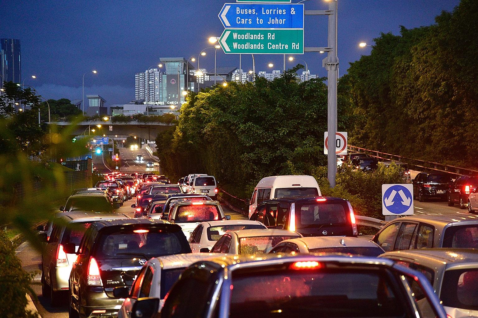 Long lines of vehicles near the Woodlands Checkpoint last Saturday. Several netizens took to the ICA's Facebook page to complain about the long queues to clear Customs and cross to Johor Baru last weekend.