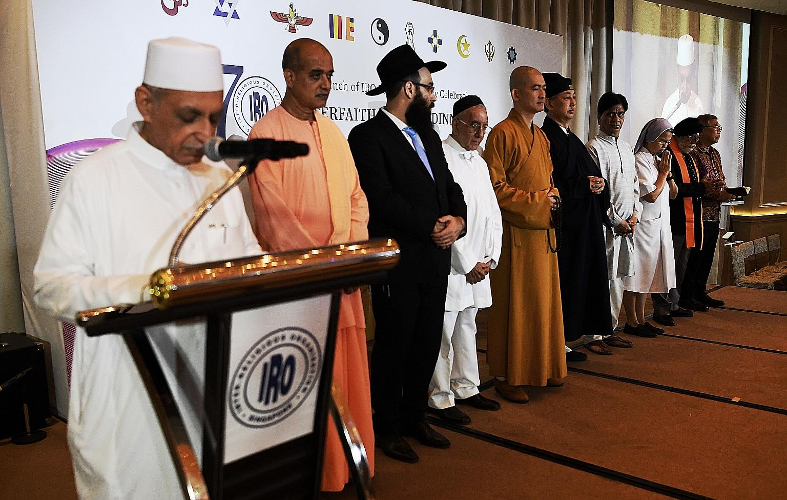 Last night's IRO charity dinner featured a silent prayer led by (from left) Imam Habib Hassan (Islam), Swami Jitnamansananda (Hinduism), Rabbi Rivni Nathienel Moshe (Judaism), Rustom Manocher Ghadiali (Zoroastrianism), Shi You Guang (Buddhism), Maste