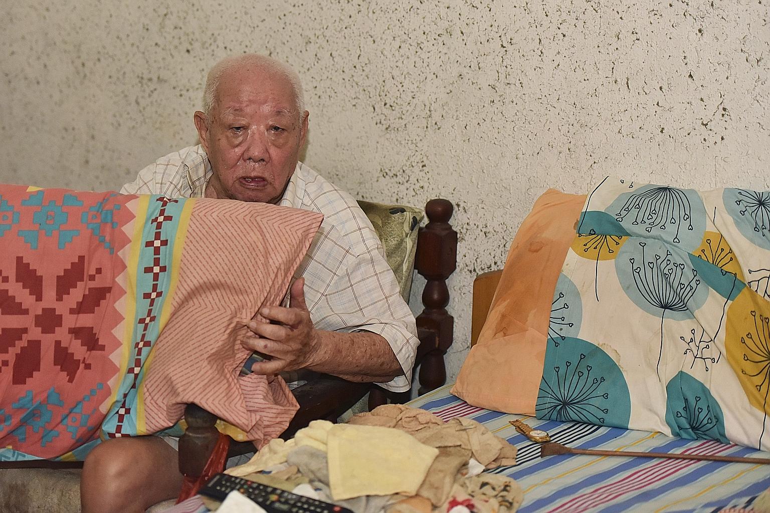 Mr Tan Lye Heng hopes to get a new pillow to replace his two old pillows.