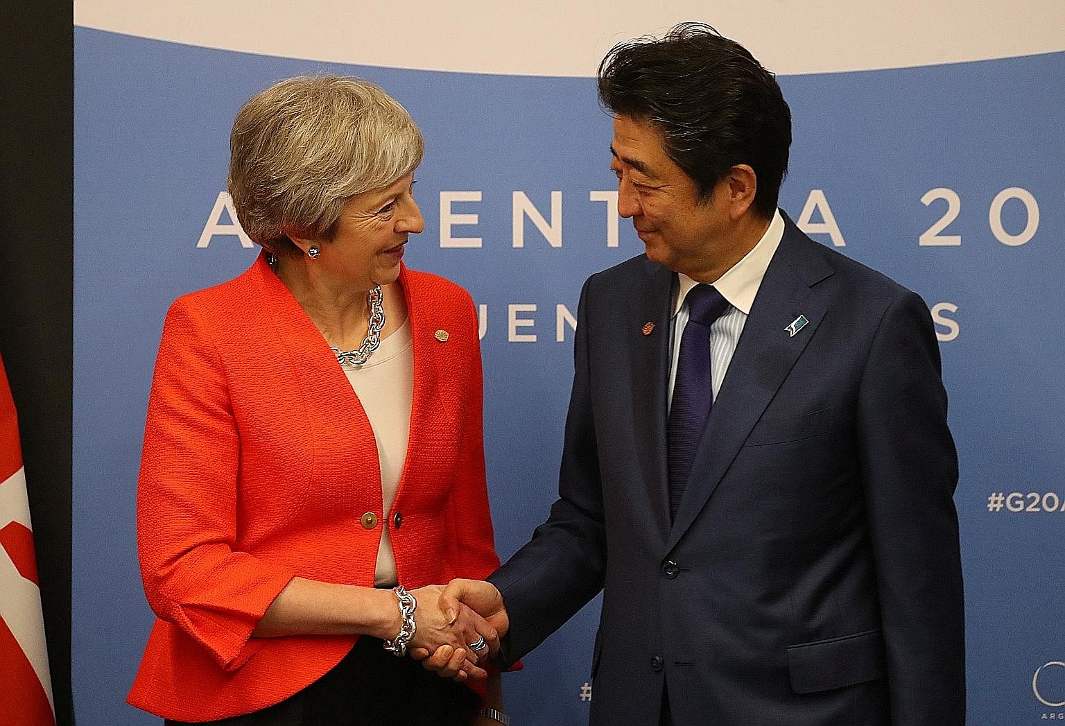 British Prime Minister Theresa May and Japanese Prime Minister Shinzo Abe at a bilateral meeting at the Group of 20 summit in Buenos Aires, Argentina, earlier this month. At the meeting, Mr Abe urged Mrs May to avoid a no-deal Brexit and ensure "tran