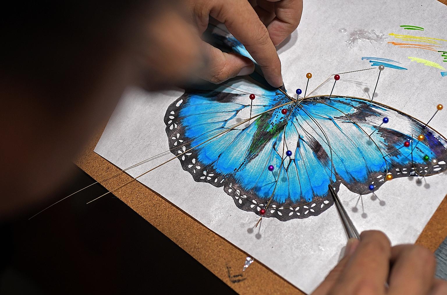 Kite-flying enthusiast Carlos Ong can fly all sorts of kites, big and small. The 45-year-old is one of the few rare hobbyists in Singapore who are able to make mini kites that are not merely decorative ornaments, but can actually fly. Of the various 