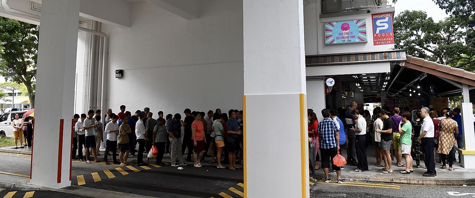More than 200 punters queueing up to buy Toto tickets at Tong Aik Huat, a Singapore Pools authorised retailer, at Block 685, Hougang Street 61, yesterday. Last night, one person won the Group 1 cascade draw prize of $9,588,137. The winning ticket was