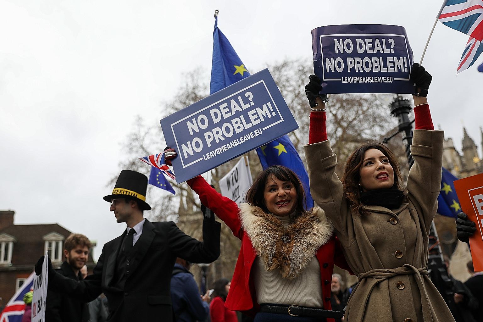 Pro-Brexit demonstrators near the Houses of Parliament in London on Tuesday. Members of the British expat community in Singapore expressed concern over the uncertain path ahead for their country after British Prime Minister Theresa May's Brexit deal