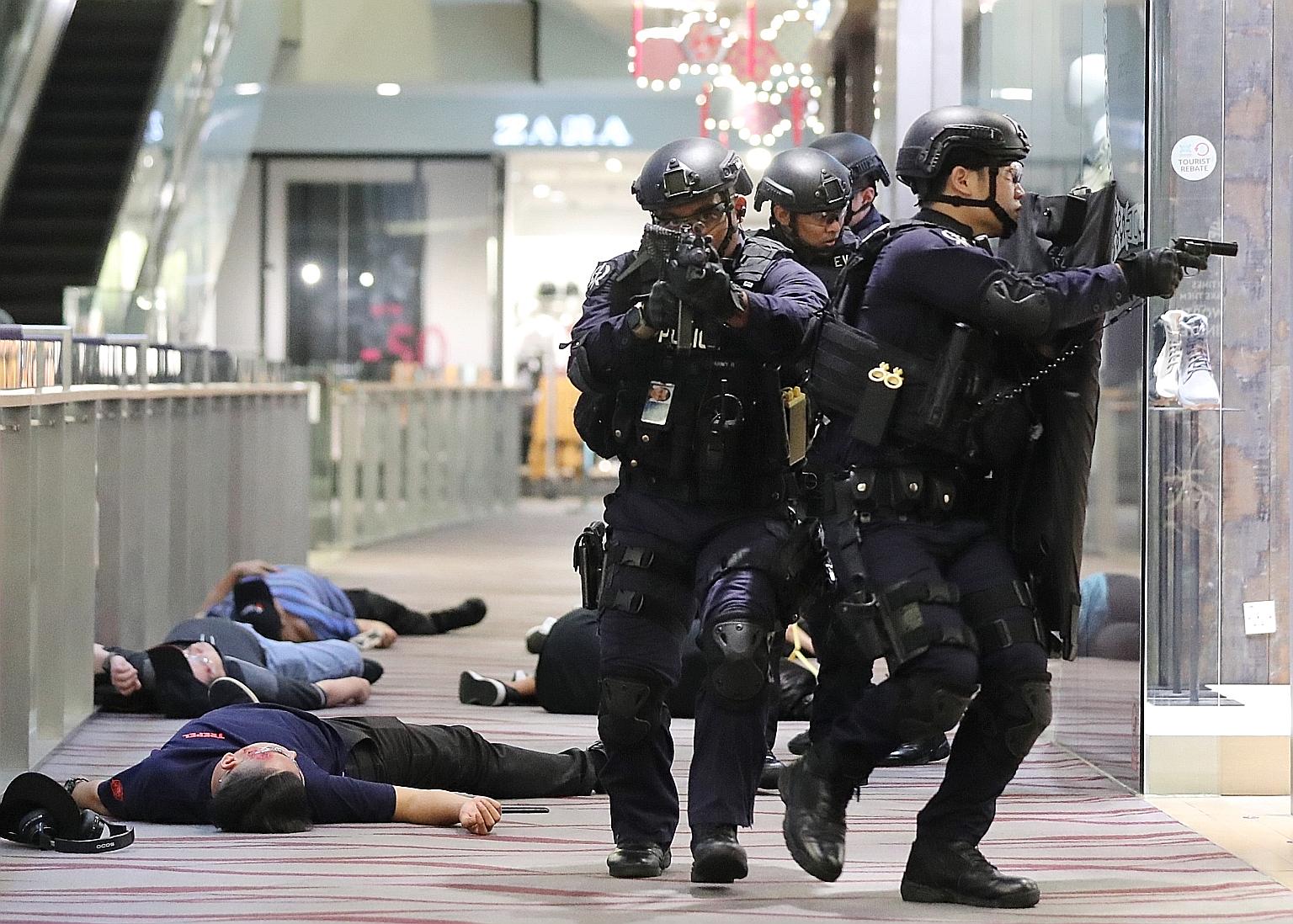 The Emergency Response Force securing the area during yesterday's counter-terrorism exercise at 313@Somerset.