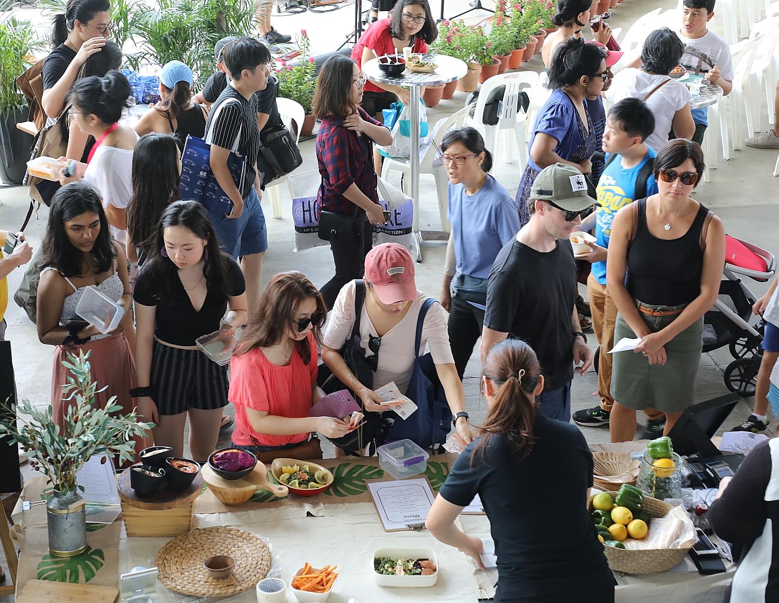EarthFest Singapore, a sustainability festival to encourage visitors to adopt responsible living habits such as minimalism, plant-based diets and living a zero-waste lifestyle, was held at Marina Barrage yesterday. A book swop and talks were among th