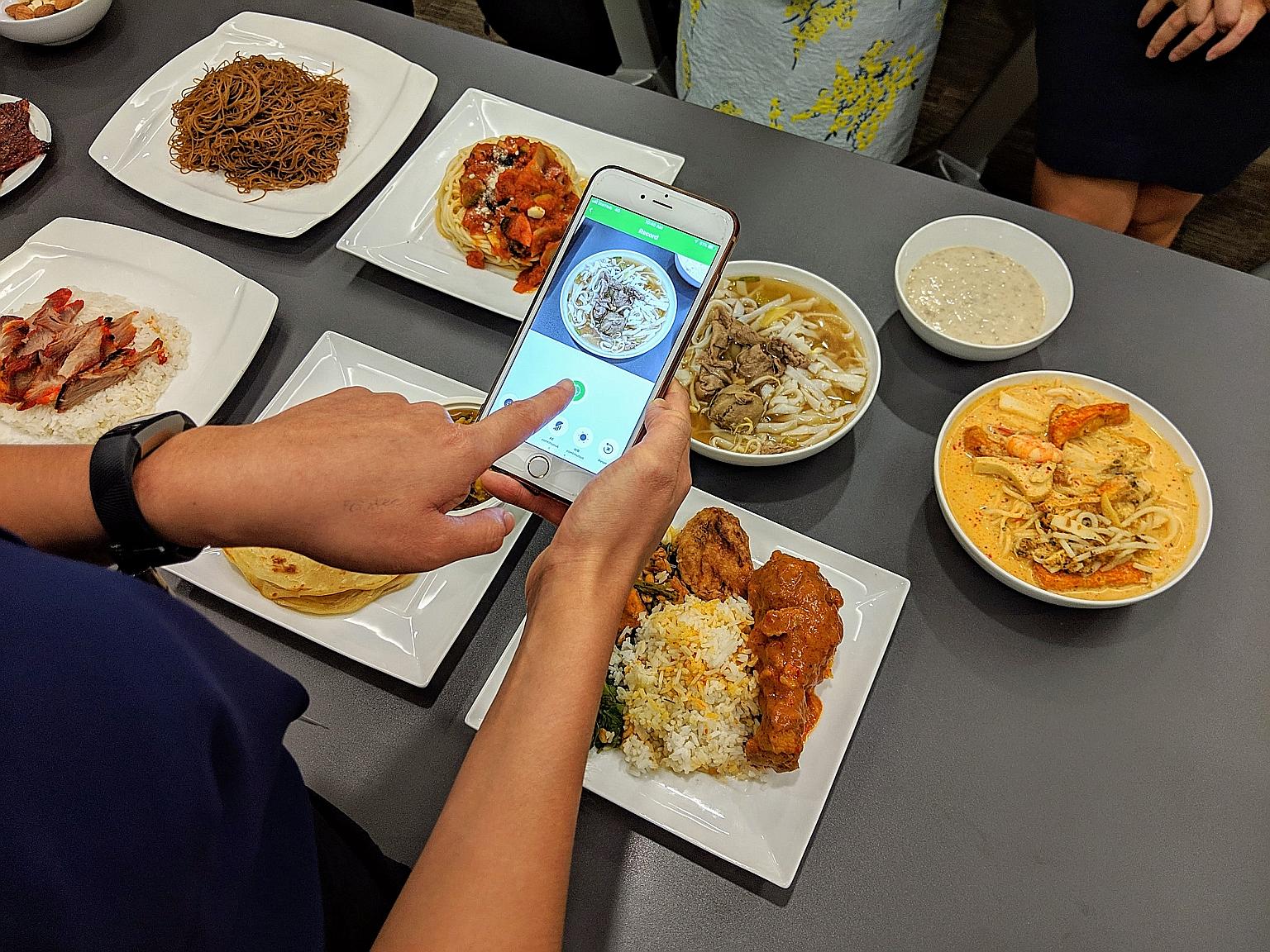The new JurongHealth Food Log app uses AI to match photos of food to a database of more than 200 common local dishes.