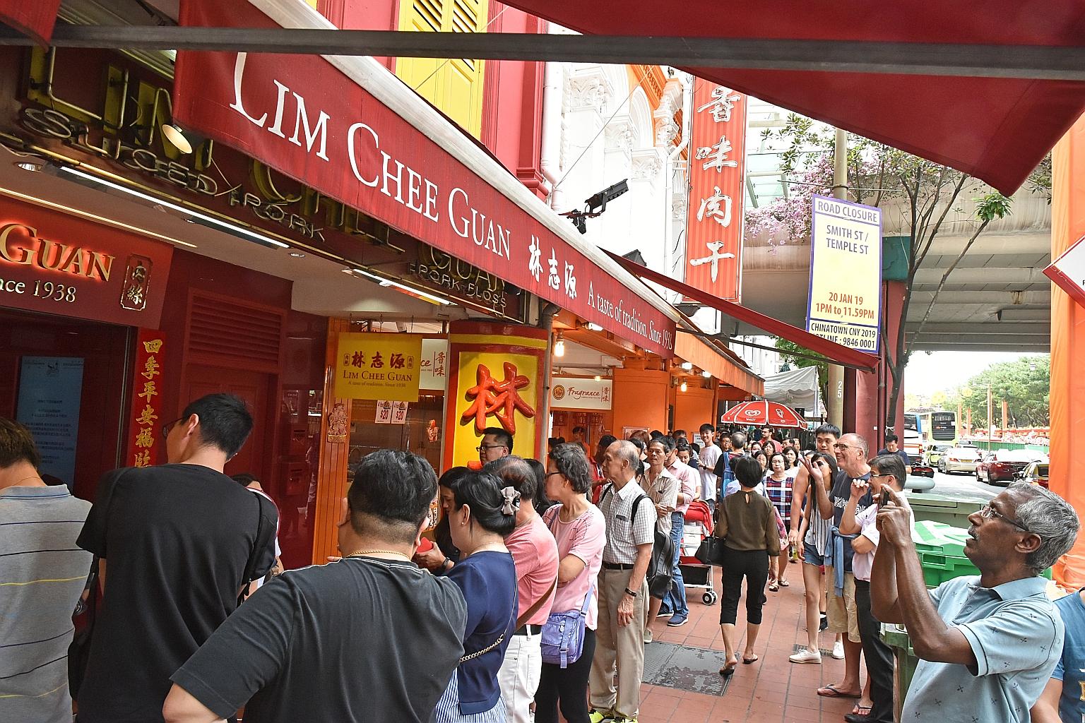With Chinese New Year less than two weeks away, long queues can be seen at popular Chinatown bak kwa outlets, such as Lim Chee Guan, whose signature pork slices for the day were sold out by lunchtime yesterday, though there were still many customers