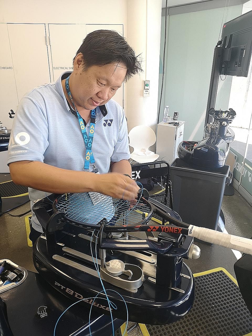 Singaporean Melvin Tan helped string more than 200 rackets as part of the Yonex racket-stringing team at the Australian Open in Melbourne.