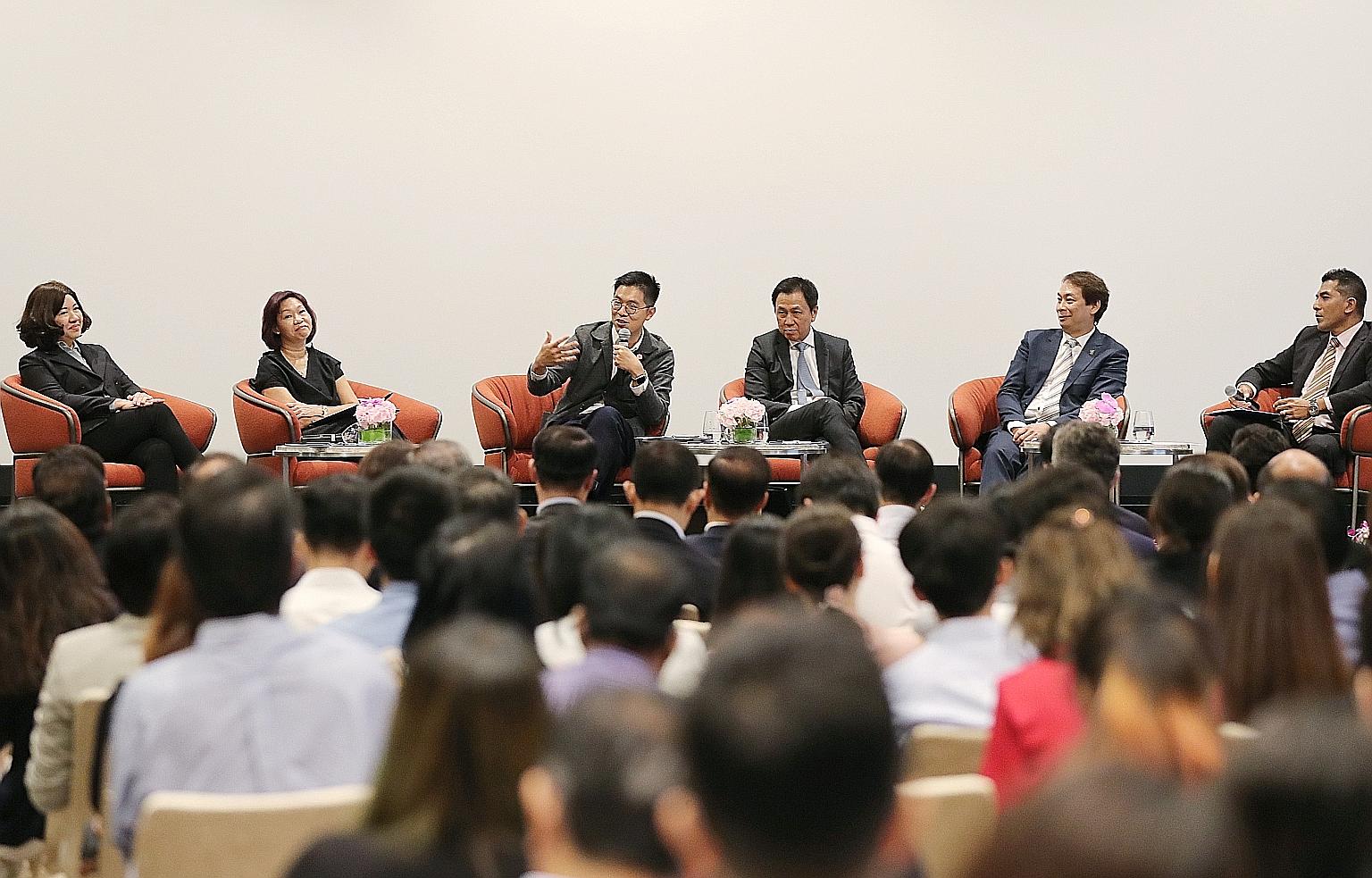 (From left) Ms Vanessa Ng, senior vice-president of human resources, Singapore Airlines; Ms Kathy Lai, deputy chief executive officer, Enterprise Singapore; Mr Chng Kai Fong, managing director, Economic Development Board; Mr Chaly Mah, chairman, Sing