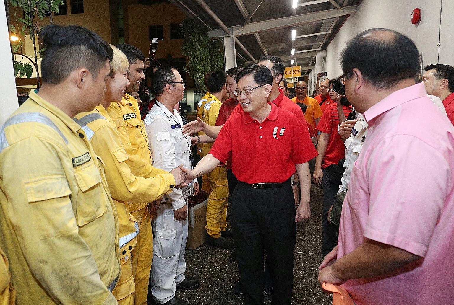 Finance Minister Heng Swee Keat visiting PSA workers on the first day of the Chinese New Year at Pasir Panjang Terminal.
