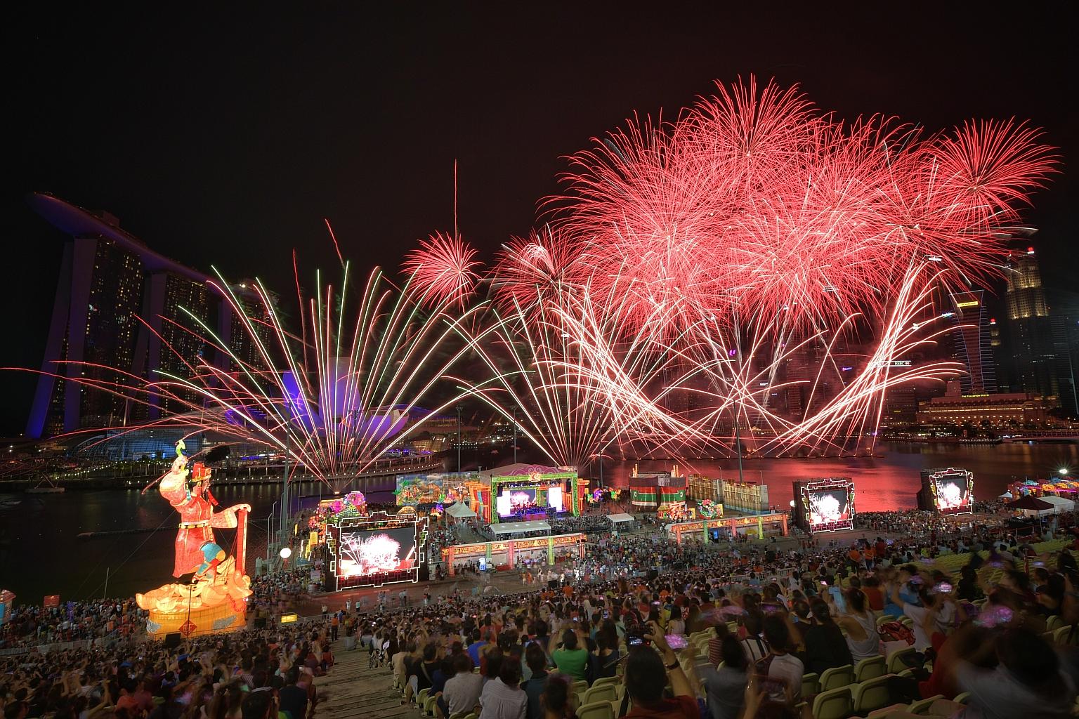 Spectators being thrilled by the fireworks display on the final night of this year's River Hongbao. The finale was themed Harmony Night.