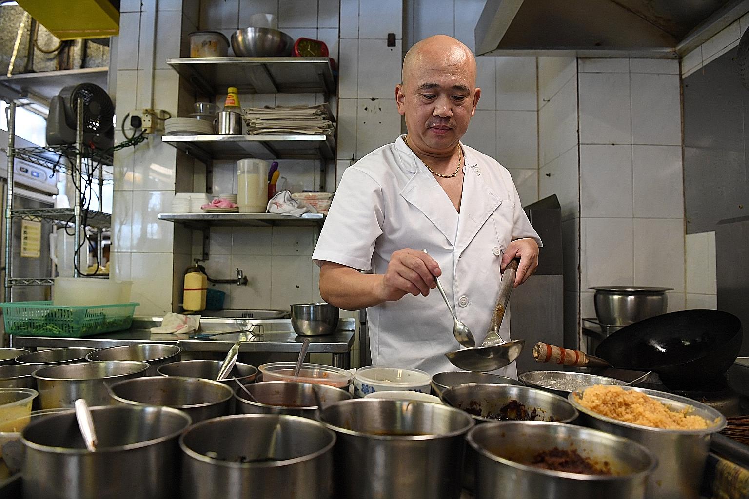 Mr Zhu Shenggang, 45, left Shandong in China to come to work in Singapore 12 years ago so he could earn more money for his children's education. The S Pass holder, who is now a head chef at halal eatery Mak's Place - The Hawkerant, works six days a w