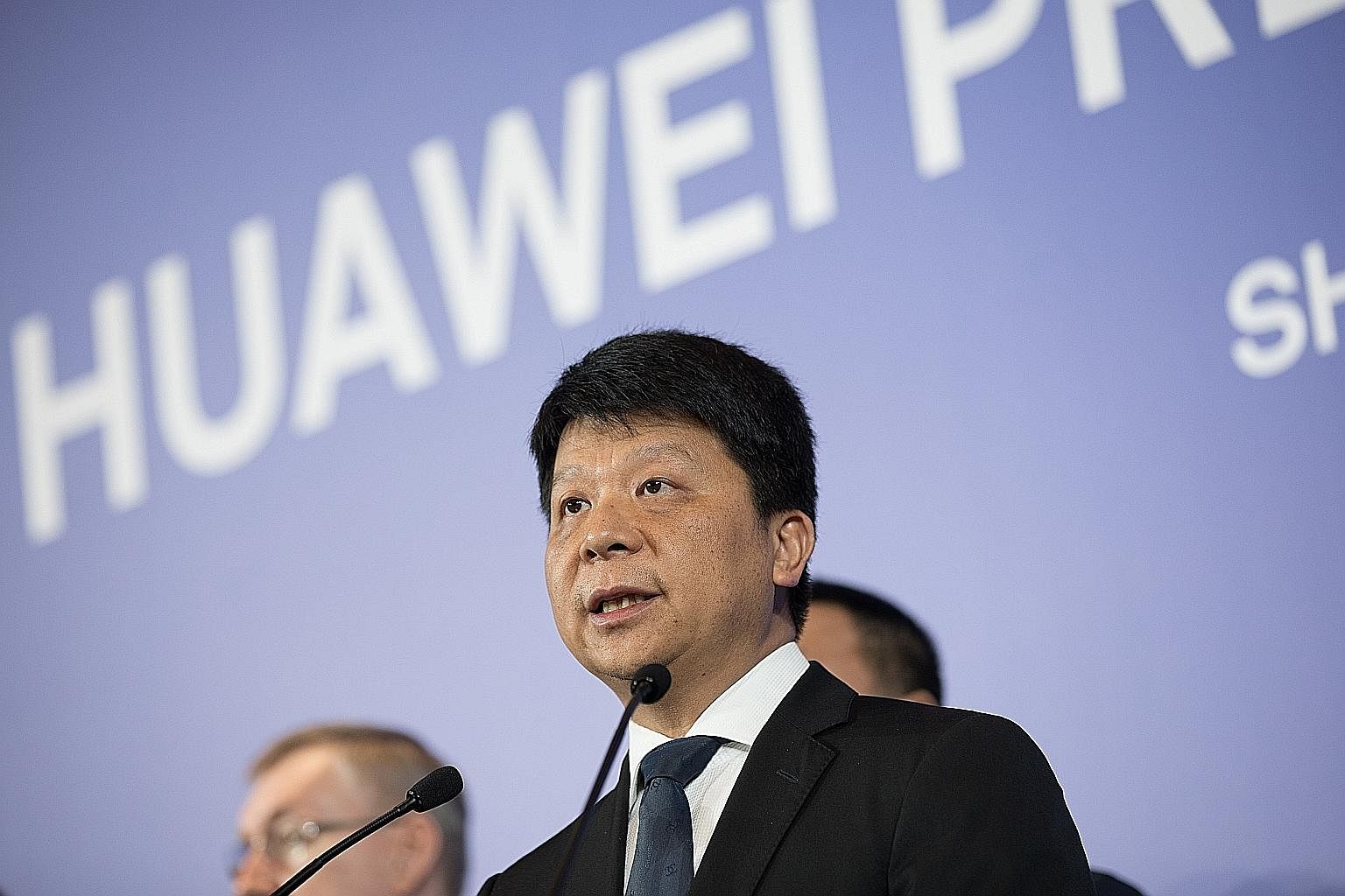 Huawei rotating chairman Guo Ping speaking at a news conference in Shenzhen, in Guangdong province, yesterday.