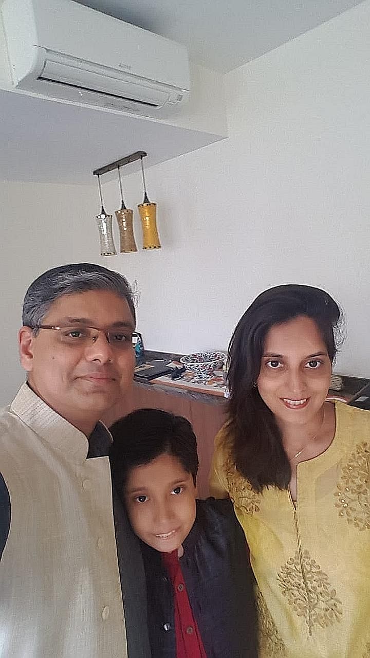 Dr Reyaz M. Singaporewalla with his wife Fatima and son Kaamil. His grandfather, Mr Fazlehusein - who was born here - and Singapore's first president, Mr Yusof Ishak, were schoolmates at Raffles Institution.