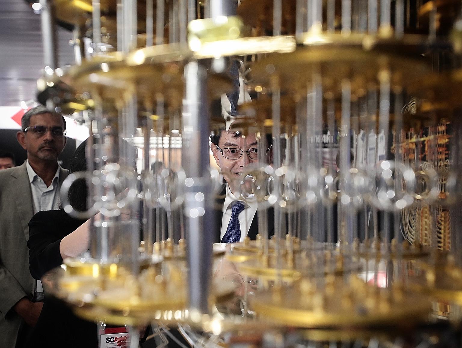 Finance Minister Heng Swee Keat checking out the IBM Q universal quantum computer model on display at the Supercomputing Asia 2019 conference yesterday. Mr Heng says the $200 million investment will significantly increase the speed of supercomputers 