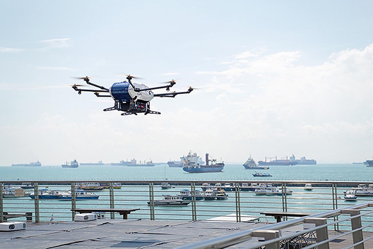A drone test being conducted off the Marina South Pier. The drone system is six times faster than delivering by boat and lowers costs by up to 90 per cent, cuts carbon emissions and reduces the risk of maritime accidents.