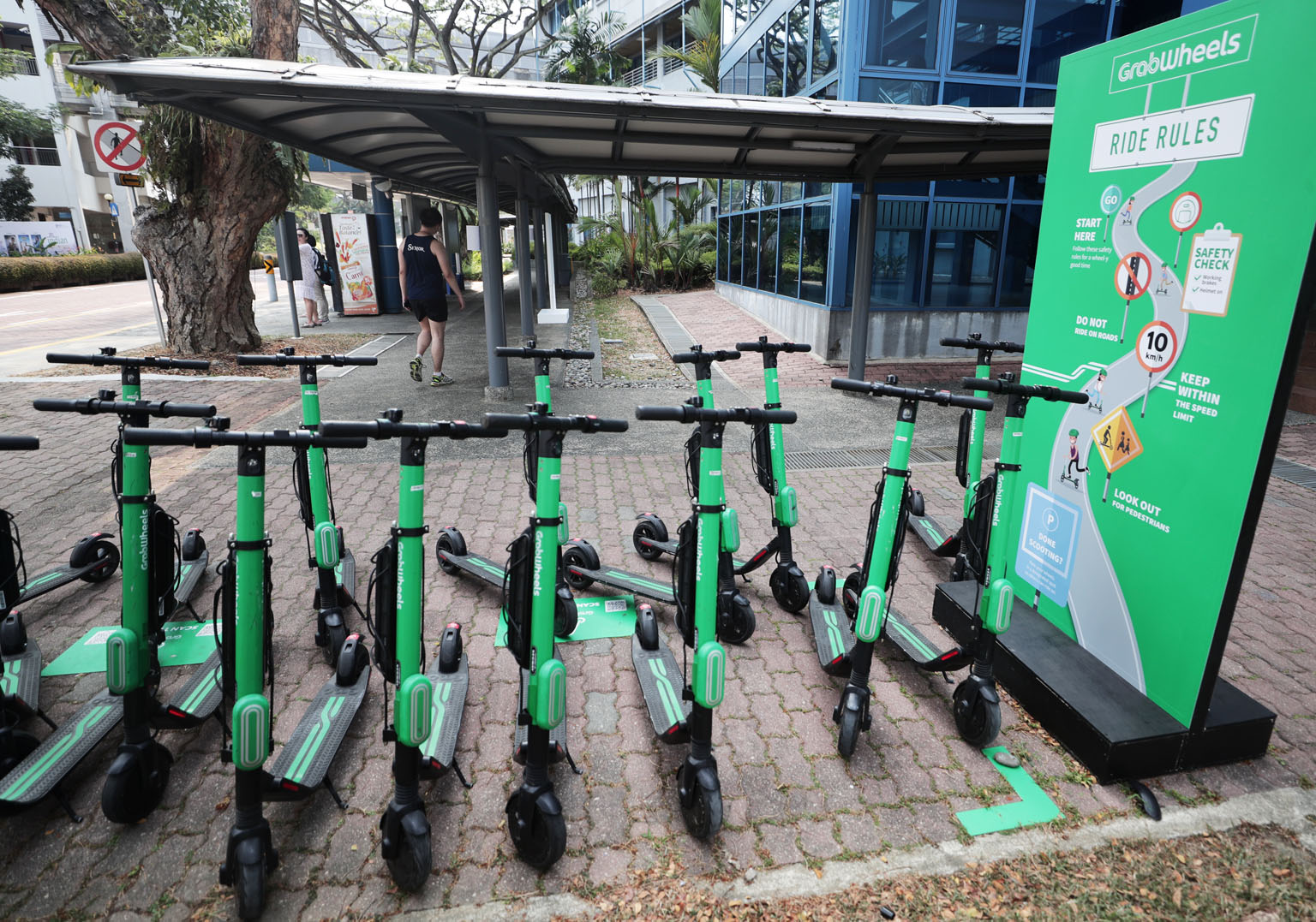 A week-long safety timeout on the GrabWheels e-scooter service trial at the National University, following a spate of injuries, will be lifted today.