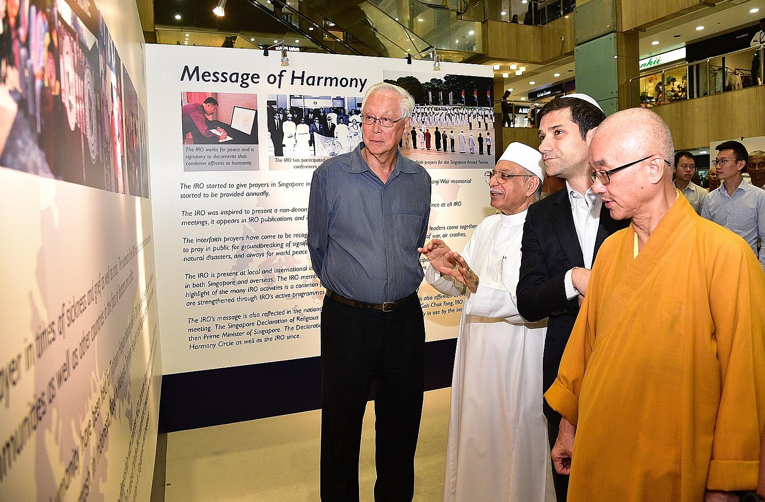 (From left) Emeritus Senior Minister Goh Chok Tong, who is patron of the Inter-Religious Organisation, Singapore with religious leaders, Imam Habib Hassan Al-Attas, Mr Ben J. Benjamin and Venerable Seck Kwang Phing, at the launch yesterday of an exhi