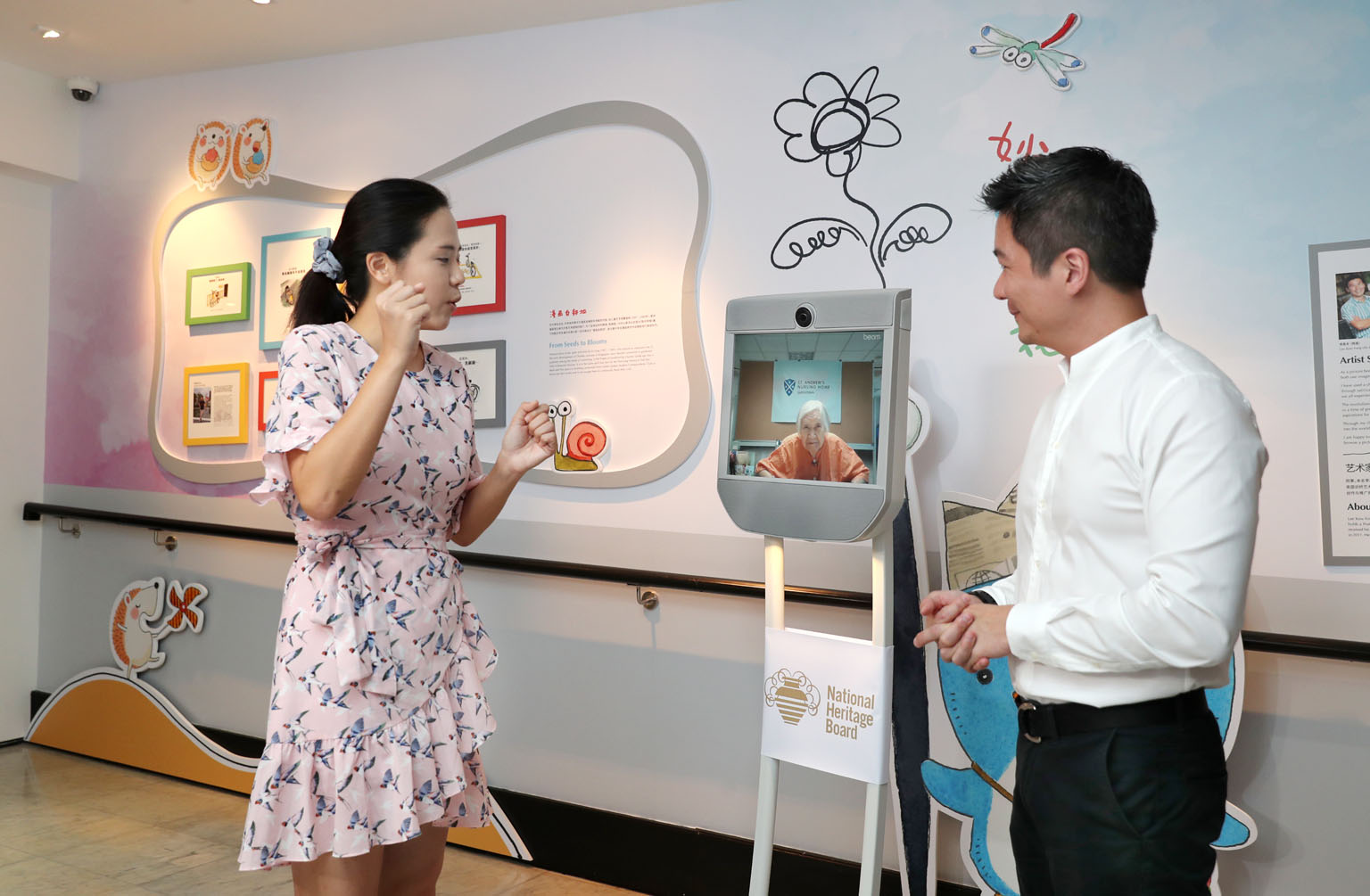 Mr Alvin Tan, assistant chief executive of the National Heritage Board, and Ms Lu Cai Xia, assistant curator of the Sun Yat Sen Nanyang Memorial Hall, with the remote-controlled Telepresence Robot. With the robot, a visitor needs only a device with a