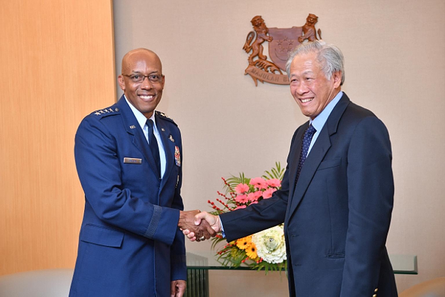 Commander of the United States Pacific Air Forces, General Charles Q. Brown Jr, meeting Defence Minister Ng Eng Hen yesterday.
