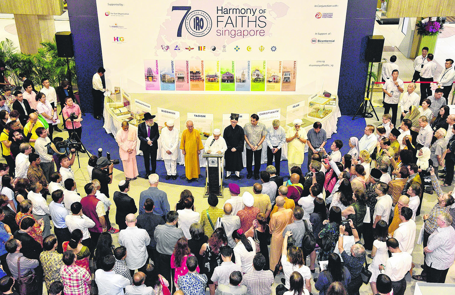 Interfaith prayers being held during the 70th anniversary of the founding of Inter-Religious Organisation, Singapore at Far East Plaza on March 18 last year. The Government has long stressed the values of multiculturalism and interfaith dialogue and 