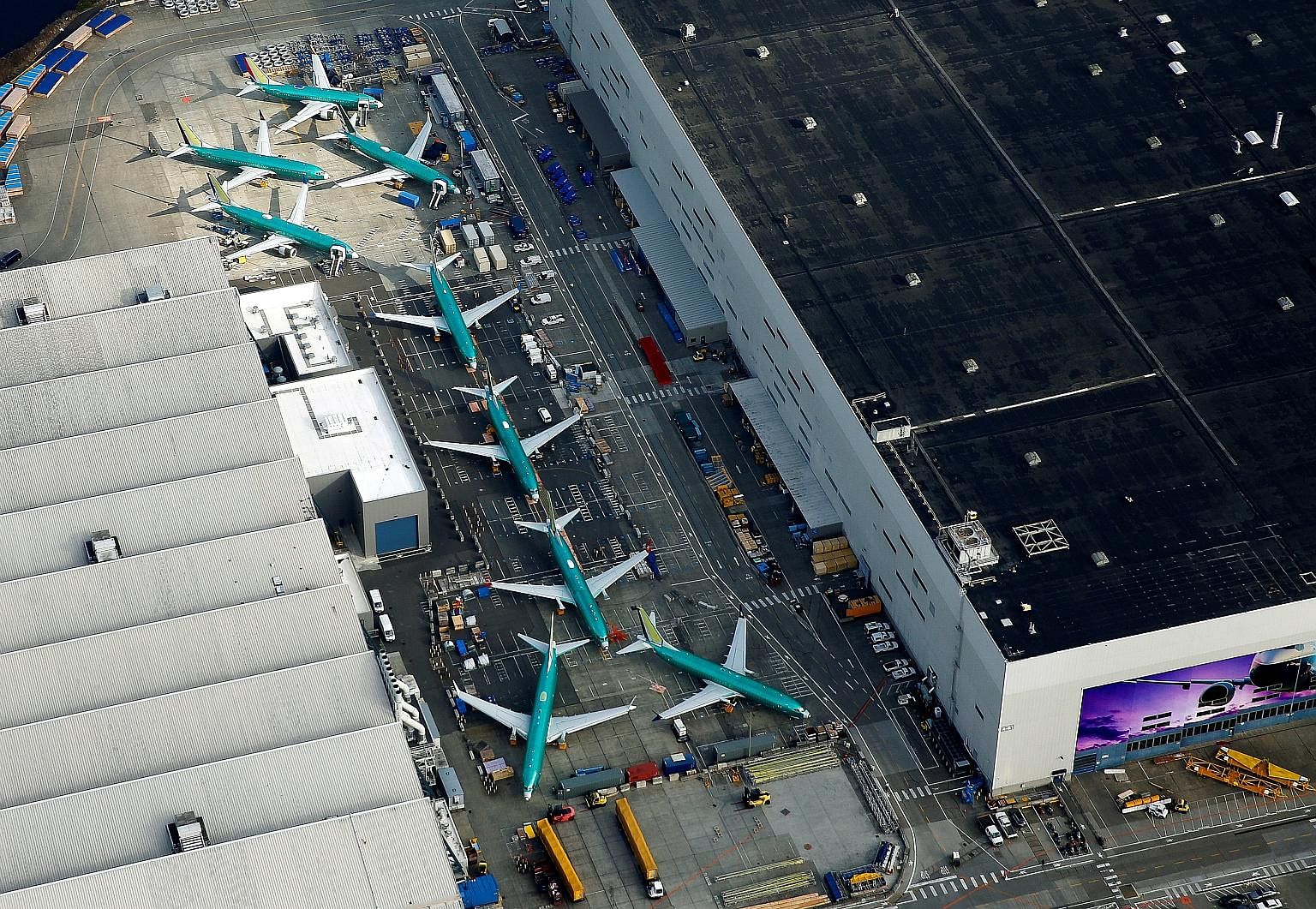 An aerial photo of Boeing 737 Max airplanes parked on the tarmac at the Boeing factory in Renton, Washington. Two crashes in five months, involving the Boeing 737 Max 8, have raised serious concerns and questions about how planes are made and certifi