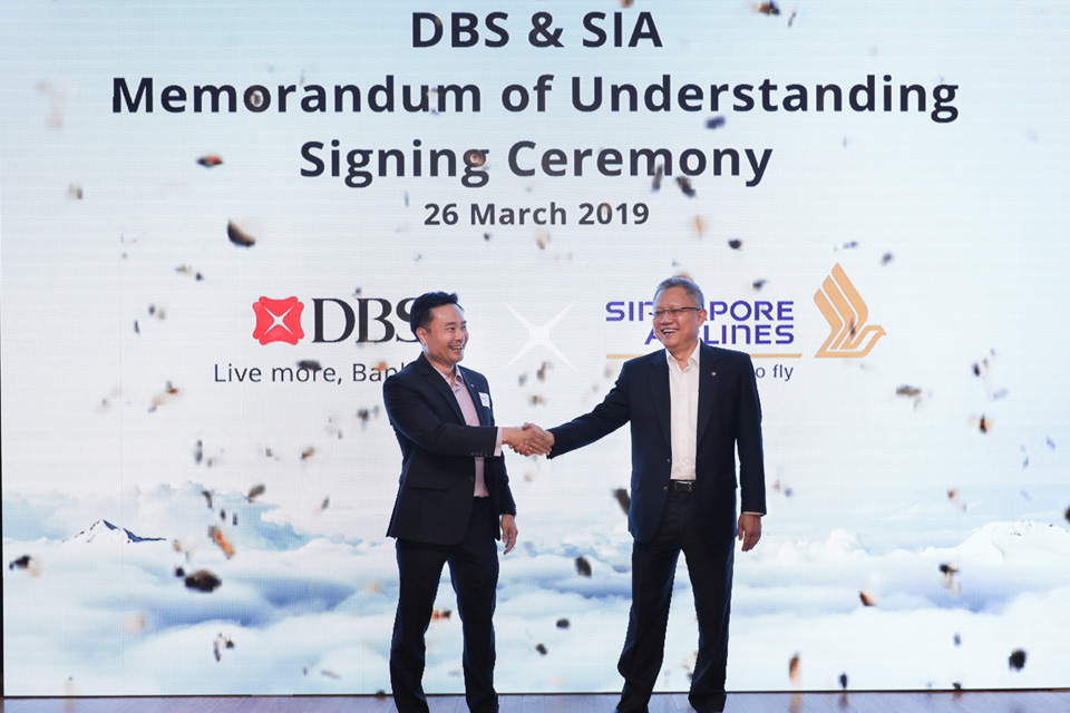 DBS Singapore country manager Shee Tse Koon (left) and SIA executive vice-president (commercial) Mak Swee Wah at the MOU signing yesterday. The two companies will launch flight booking and merchandising capabilities on DBS' platforms and a DBS-SIA Re